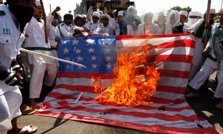 The US flag is burned in protest against the film The Innocence of Muslims.