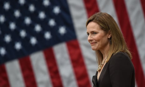 Judge Amy Coney Barrett attends an event to mark her nomination at the White House Rose Garden last month.