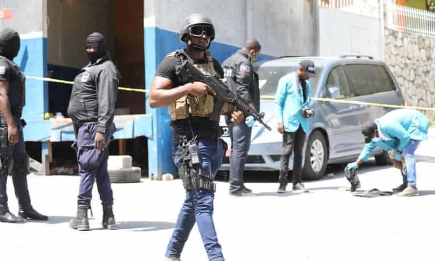 HAITI-POLITICS-ASSASSINATION-MOISEMembers of the Haitian police and forensics look for evidence outside of the presidential residence on July 7, 2021 in Port-au-Prince, Haiti. - Haiti President Jovenel Moise was assassinated and his wife wounded early July 7, 2021 in an attack at their home, the interim prime minister announced, an act that risks further destabilizing the Caribbean nation beset by gang violence and political volatility. Claude Joseph said he was now in charge of the country and urged the public to remain calm, while insisting the police and army would ensure the population’s safety.The capital Port-au-prince as quiet on Wednesday morning with no extra security forces on patrol, witnesses reported. (Photo by VALERIE BAERISWYL / AFP) (Photo by VALERIE BAERISWYL/AFP via Getty Images)