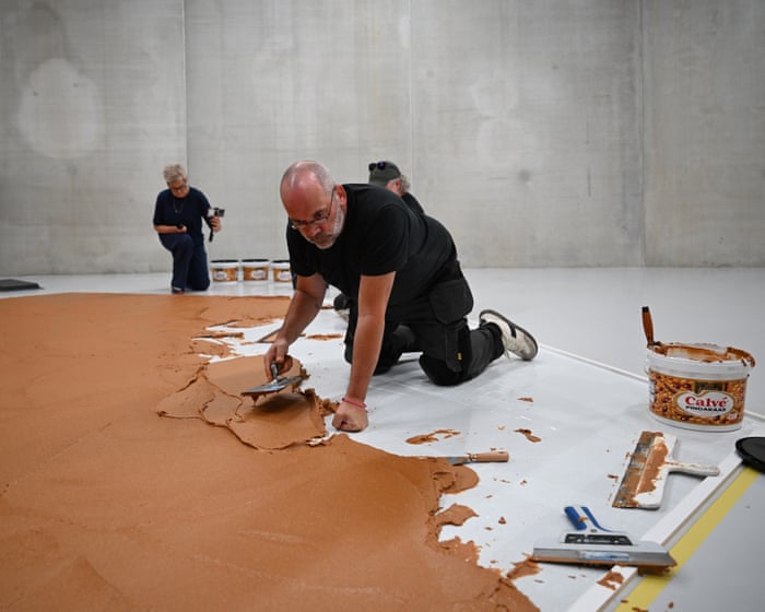 Completely nuts: Dutch gallery covers floor in peanut butter to honour late artist
