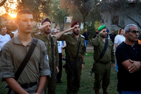 Residents of the Kfar Aza kibbutz gather to commemorate the second anniversary of the Hamas attacks.