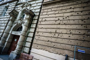 Bullet holes on a wall of a house of the Sophiengemeinde community