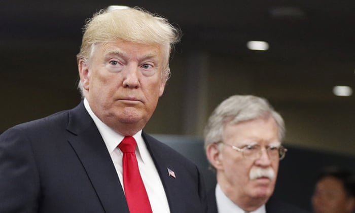 Bolton with Trump, his former employer.