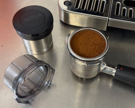 Ninja Cafe Luxe coffee machine basket with ground coffee.