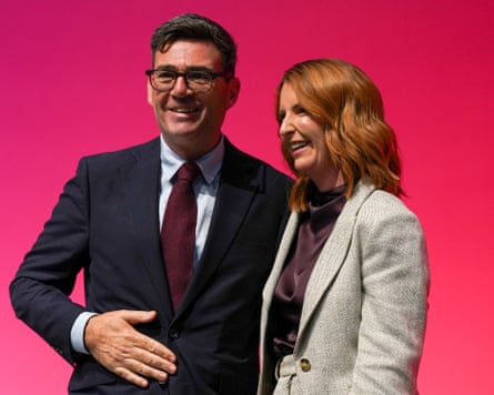 Andy Burnham smiles beside Louise Haigh at the Labour party conference