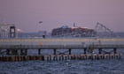 Baltimore bridge collapse: at least six missing after ship crashes into bridge