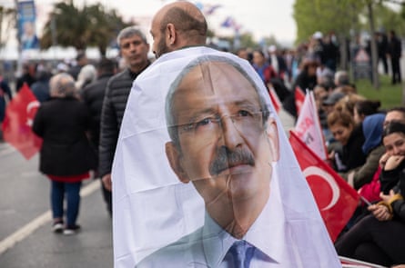 A supporter of Kemal Kılıçdaroğlu wears his image at a rally in Istanbul.