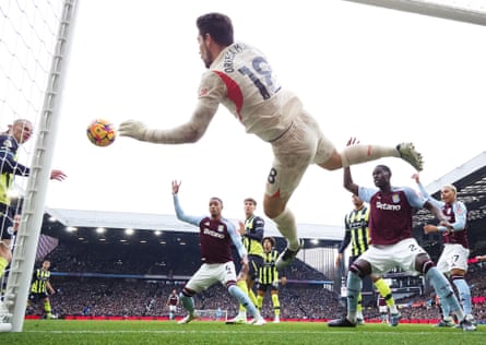 Stefan Ortega of Manchester City makes a save from Ezri Konsa of Aston Villa