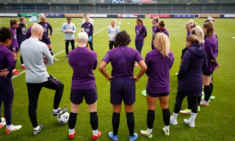 England manager Sarina Wiegman talks to her squad ahead of a training session this week