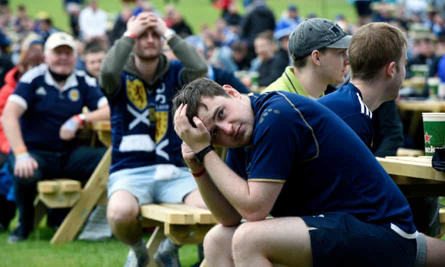 Scotland fans watching in the Glasgow fan zone reflect the adverse scoreline inside Hampden Park.