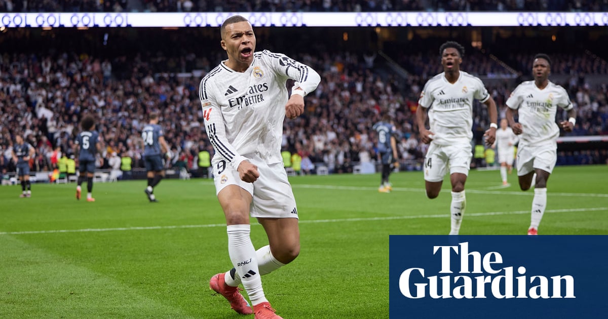 Real Madrid defeats Rayo Vallecano, ties Barcelona atop La Liga