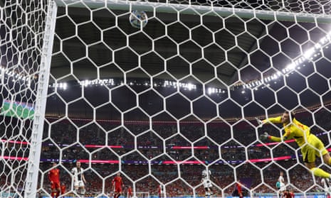 Mighty save: Manuel Neuer of Germany tips the ball onto the crossbar.