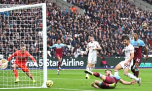 Robert Snodgrass of West Ham United slides for the ball but can’t steer it into the net.