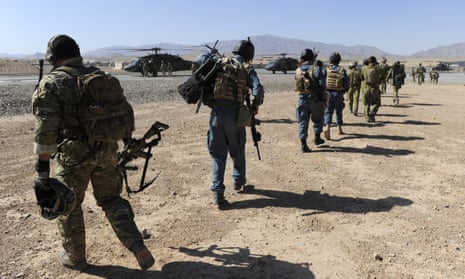 Australian and Afghan soldiers conduct an operation in Afghanistan in June 2010