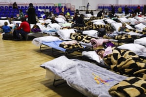 Civilians take shelter at sport hall after Ukrainian refugees arrived in Poland due to ongoing Russian attacks in Ukraine, Przemysl, Poland on March 01, 2022.