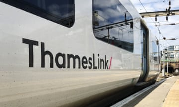 A ThamesLink train carriage at a station platform