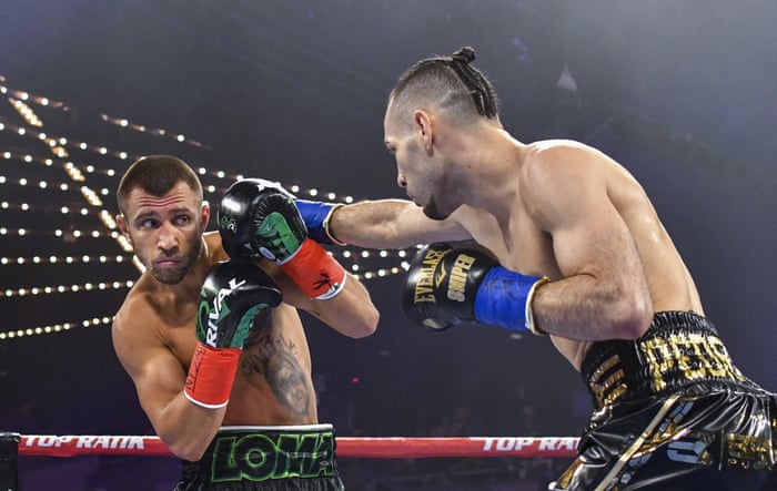 Vasiliy Lomachenko Overwhelms Jose Pedraza Late To Unify Lightweight Titles Boxing The Guardian
