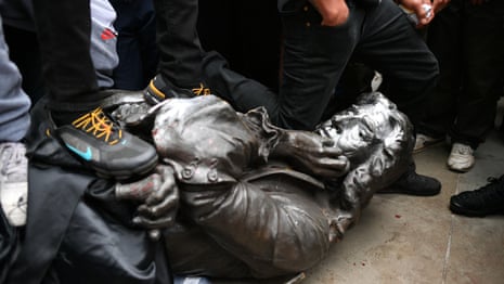 Cheers as Bristol protesters pull down statue of 17th century slave trader – video