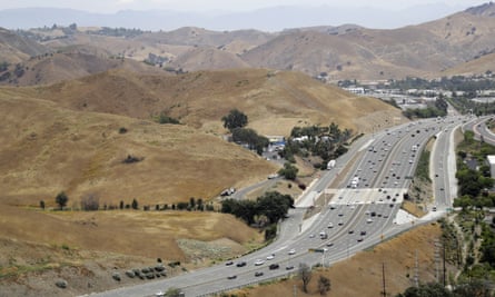 US Highway 101 passes between two separate open space preserves on conservancy lands in the Santa Monica Mountains in Agoura Hills, California.