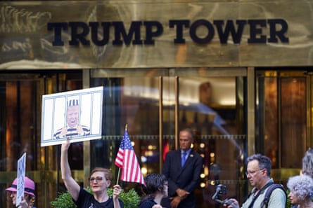 Protesters gathered outside Trump Tower in New York, a day after the FBI search.