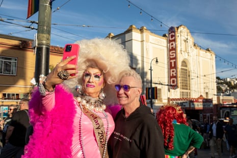 Fans of Dolly Parton gather to celebrate the life of the country singer at Harvey Milk Plaza in the Castro District of San Francisco.
