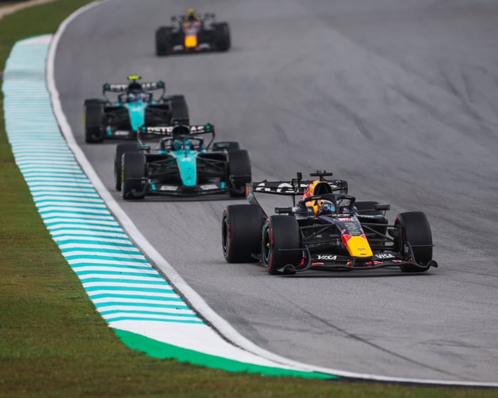 Bahrain GP in Malaysia: F1 race updates after long rain delay and chaotic buildup – live