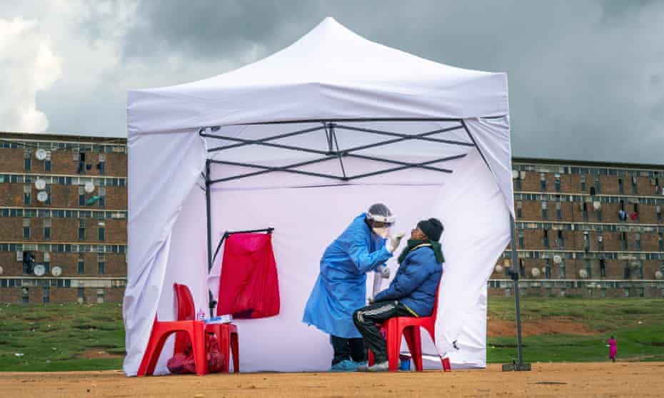 A resident from the Alexandra township gets tested for Covid-19 in Johannesburg, South Africa.