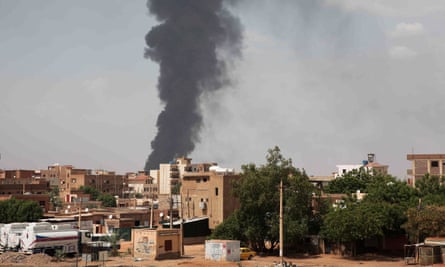 Smoke rises over Khartoum