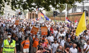 Protesters take part in a rally against vaccination policies in Sydney