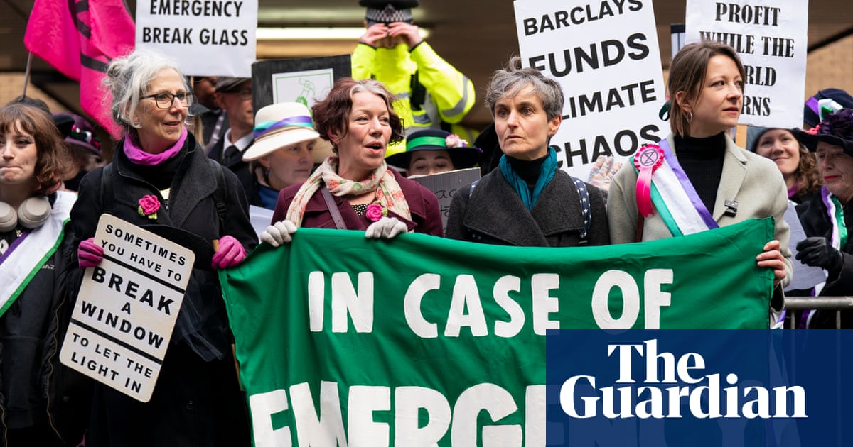 Climate activists guilty of smashing Barclays HQ windows spared jail - The Guardian