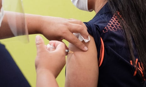 A border worker receives a dose of the COVID-19 vaccine in Auckland, New Zealand,