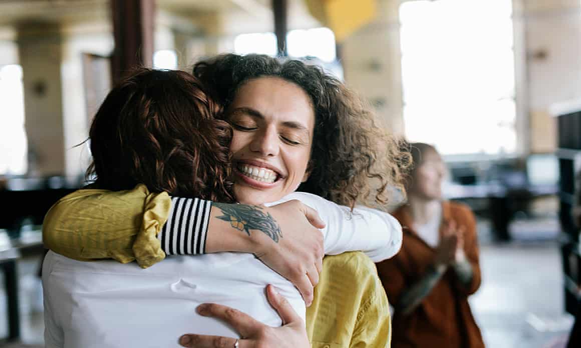 Two women hugging