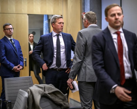 US Secretary of the Army Daniel Driscoll (C) speaks with US staff after a closed-door talks with the Ukrainian delegation on a US plan to end the war in Ukraine at the US Mission in Geneva, Switzerland.