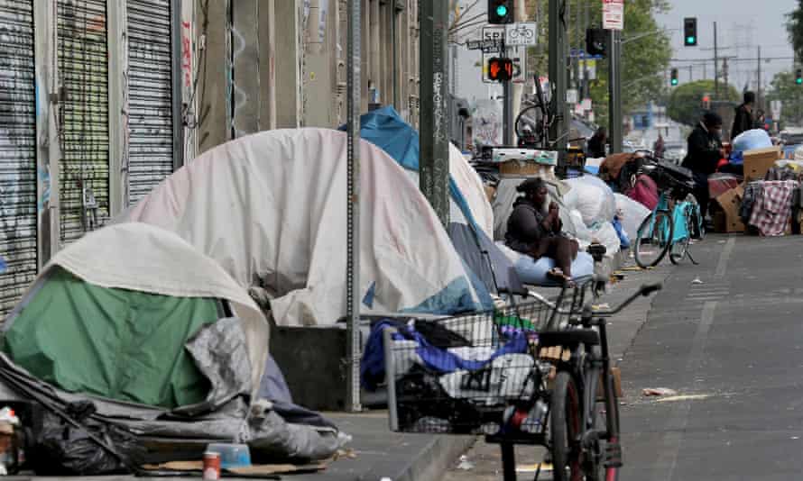 Whole blocks are filled with homeless encampments on a row of skids in downtown Los Angeles.