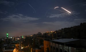 Syrian air defence batteries responding to missiles targeting Damascus