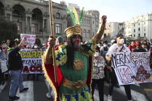 A man dressed as the Inca Pachacutec marches against the removal of president Martin Vizcarra on November 12