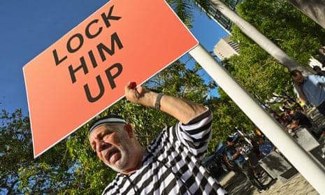 Dominic Santana, who is not a fan of the former president, outside the Wilkie D Ferguson Jr US courthouse in Miami.