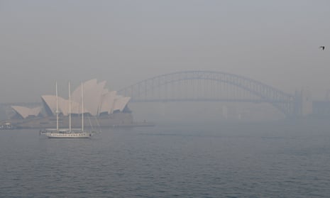 harbour bridge and opera house in smoke haze