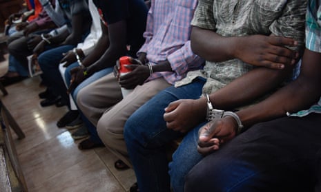 Suspects involved in sexual and gender-based violence cases attend a special session at the Kampala high court in Uganda