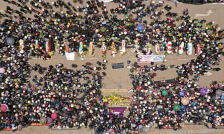 Relatives and friends of the victims put their coffins in the main plaza of Juliaca, Peru, on 11 January.