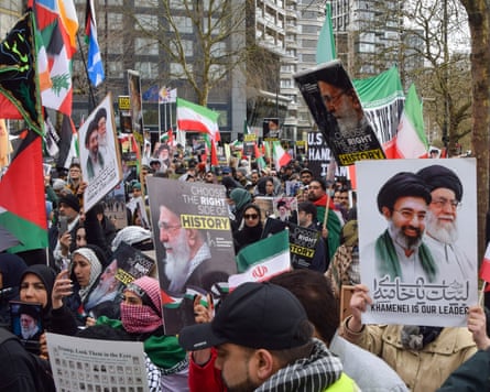 Protesters hold Iranian flags and pictures of Ali Khamenei and Mojtaba Khamenei during the al-Quds Day rally in Albert Embankment last week.