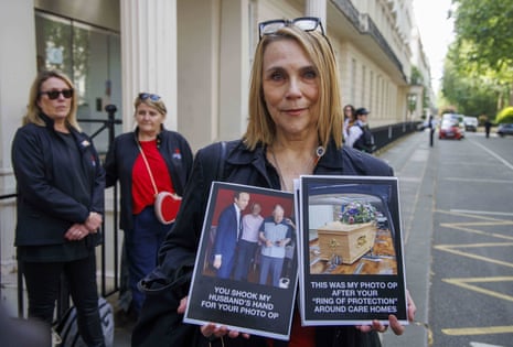Lorelei King, 69, protesting outside the Covid inquiry this morning. outside the Inquiry. Her husband, Vincent Marzello, died in March 31 2020. Matt Hancock shook his hand but he died in a care home despite Hancock's assurance of a 'ring of protection' around care homes.