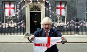 Boris Johnson, whose reopening plans have been criticised, holding an England flag outside Number 10 ahead of the Euro 2020 final against Italy on Sunday.