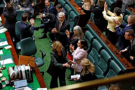 Victorian premier Jacinta Allan and other MPs react after the bill is passed