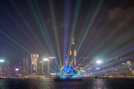 A laser show is seen over Victoria Harbour for the New Year’s Eve celebrations in Hong Kong.