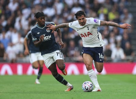 Sandro Tonali tussles with Anthony Elanga.