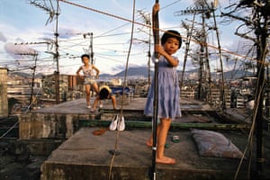 Children playing on Walled City rooftop, Hong Kong, 1989The lack of formal governance in the Walled City led to challenges, but it also fostered a unique system of informal social order
