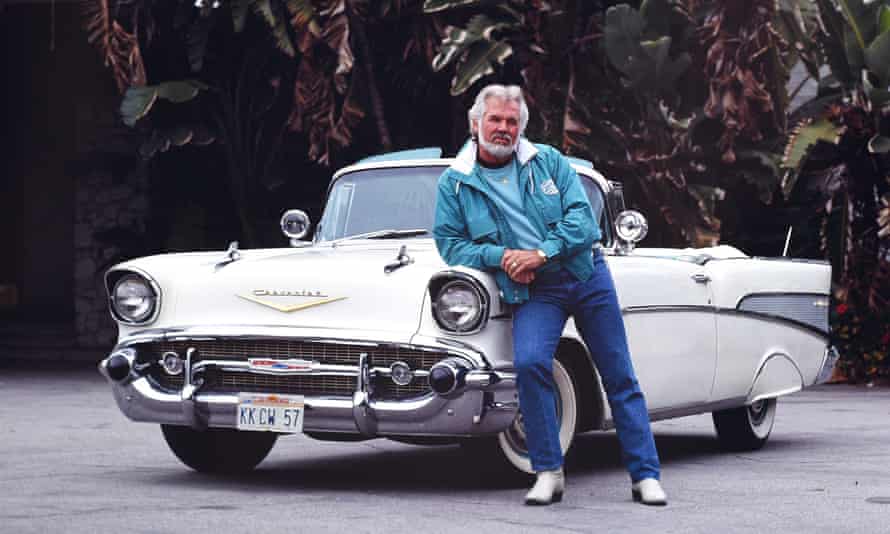 Kenny Rogers with his 1957 convertible Chevrolet in Beverly Hills, Los Angeles, in 1990.