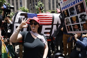 Supporters of former president Donald Trump demonstrate outside the courthouse.