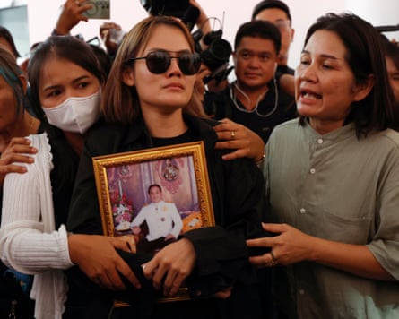 The wife of a teacher killed in the Debsirin Nonthaburi school shooting weeps